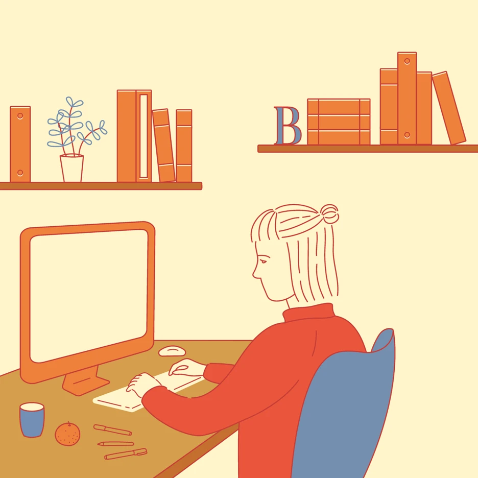 mixkit-woman-sitting-at-a-computer-desk-typing-on-a-keboard-29-original