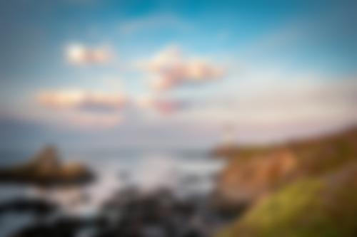 The coastal landscape blurred beyond recognition