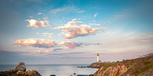 A wide crop with the lighthouse against the top edge