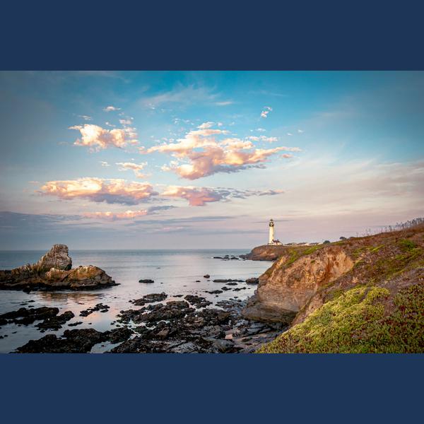 The coastal landscape padded to a 600 by 600 square with dark blue bands above and below